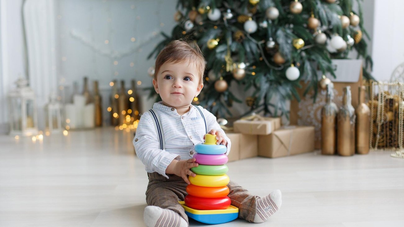 cute-baby-with-toys_624325-3255